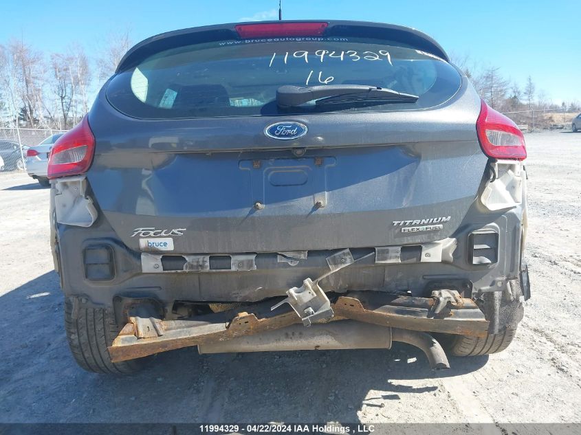 2016 Ford Focus Titanium VIN: 1FADP3N26GL209718 Lot: 11994329