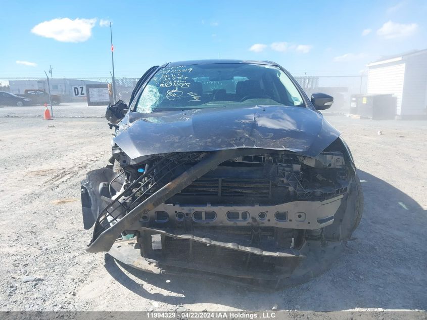 2016 Ford Focus Titanium VIN: 1FADP3N26GL209718 Lot: 11994329