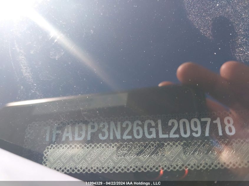 2016 Ford Focus Titanium VIN: 1FADP3N26GL209718 Lot: 11994329