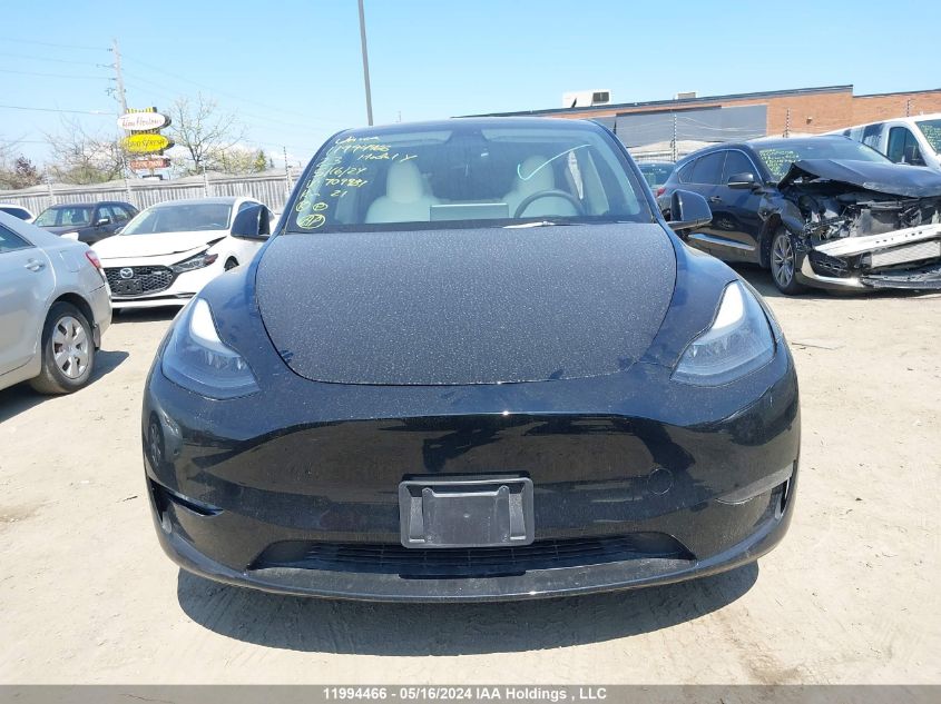 2023 Tesla Model Y VIN: 7SAYGDEEXPF709981 Lot: 11994466