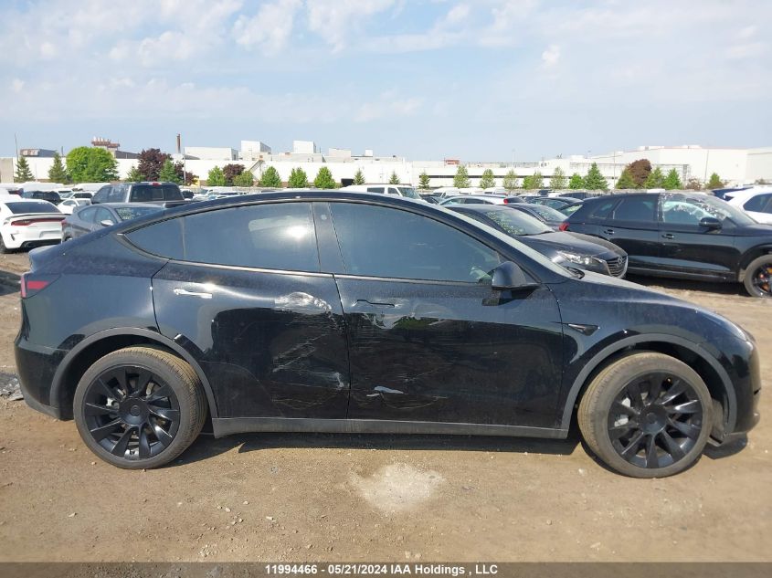 2023 Tesla Model Y VIN: 7SAYGDEEXPF709981 Lot: 11994466