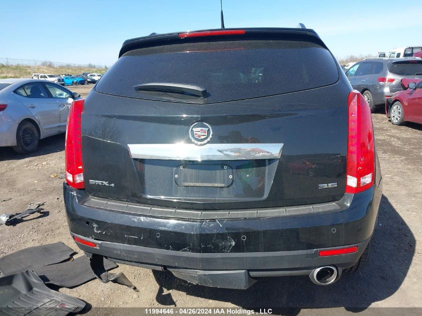 2014 Cadillac Srx VIN: 3GYFNEE34ES560352 Lot: 11994646
