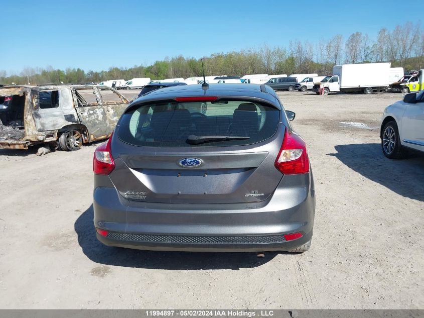 2014 Ford Focus VIN: 1FADP3K27EL338083 Lot: 11994897