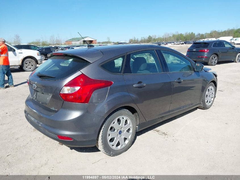 2014 Ford Focus VIN: 1FADP3K27EL338083 Lot: 11994897