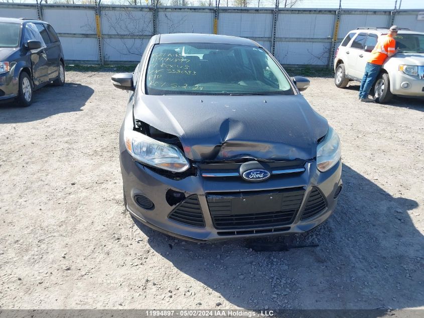 2014 Ford Focus VIN: 1FADP3K27EL338083 Lot: 11994897