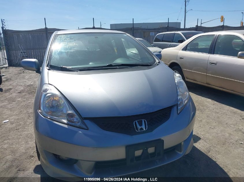 2009 Honda Fit VIN: JHMGE88879S803798 Lot: 11995096