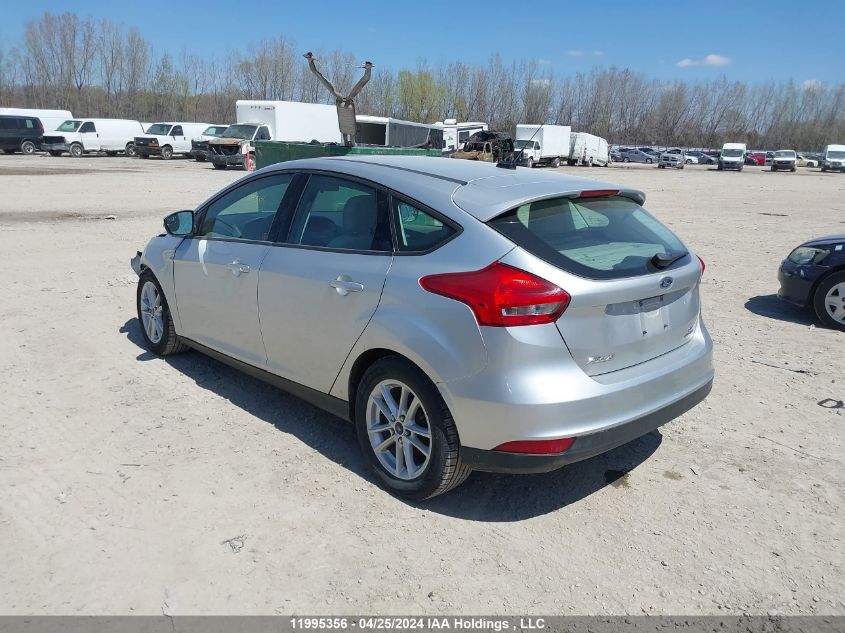 2015 Ford Focus VIN: 1FADP3K28FL284777 Lot: 11995356