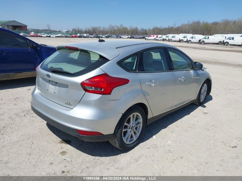 2015 Ford Focus VIN: 1FADP3K28FL284777 Lot: 11995356