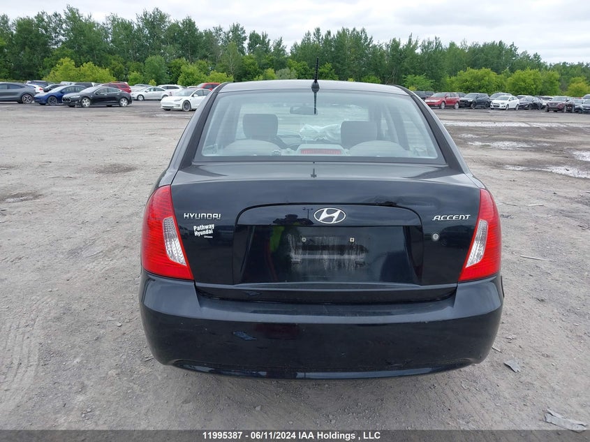 2007 Hyundai Accent VIN: KMHCN45C57U161094 Lot: 11995387