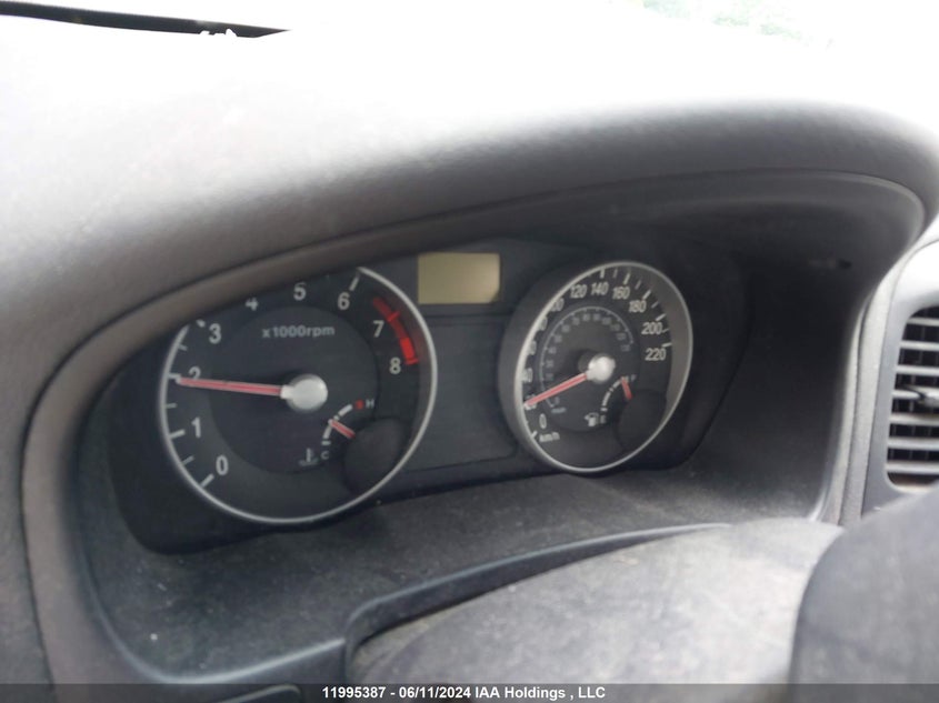 2007 Hyundai Accent VIN: KMHCN45C57U161094 Lot: 11995387