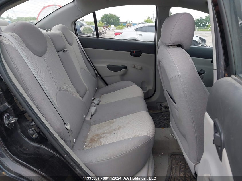 2007 Hyundai Accent VIN: KMHCN45C57U161094 Lot: 11995387