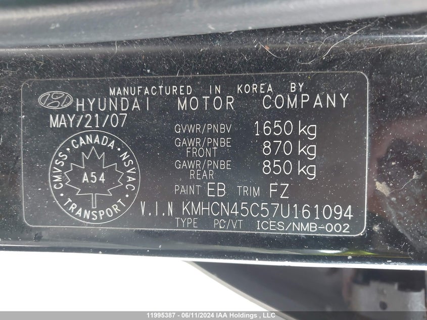 2007 Hyundai Accent VIN: KMHCN45C57U161094 Lot: 11995387