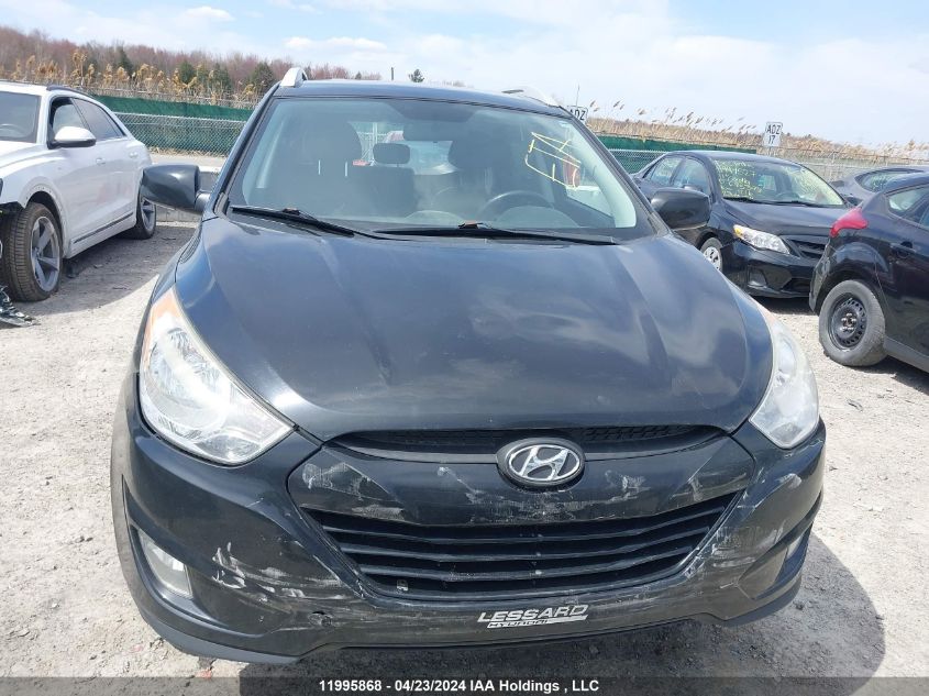 2012 Hyundai Tucson VIN: KM8JUCAC4CU406469 Lot: 11995868