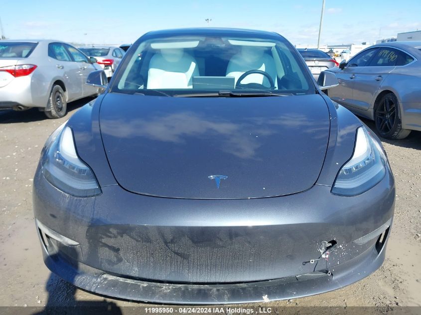 2020 Tesla Model 3 VIN: 5YJ3E1EB8LF670643 Lot: 11995950