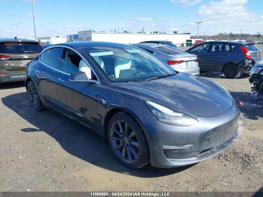 2020 Tesla Model 3 VIN: 5YJ3E1EB8LF670643 Lot: 11995950