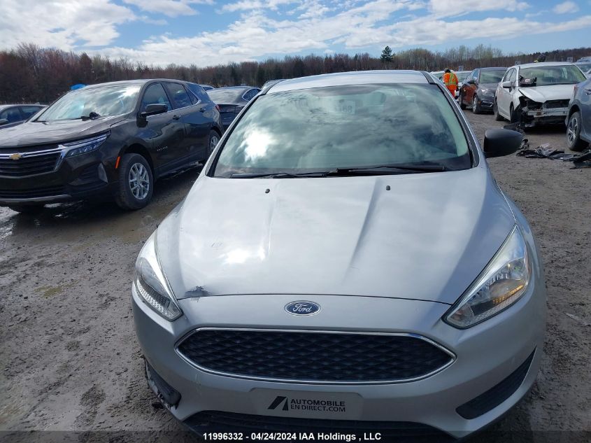 2015 Ford Focus S VIN: 1FADP3E23FL297030 Lot: 11996332