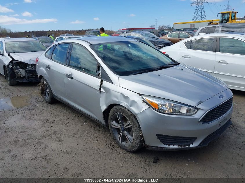 2015 Ford Focus S VIN: 1FADP3E23FL297030 Lot: 11996332