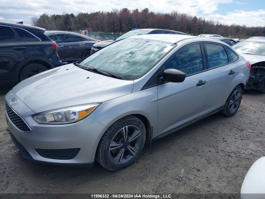 2015 Ford Focus S VIN: 1FADP3E23FL297030 Lot: 11996332