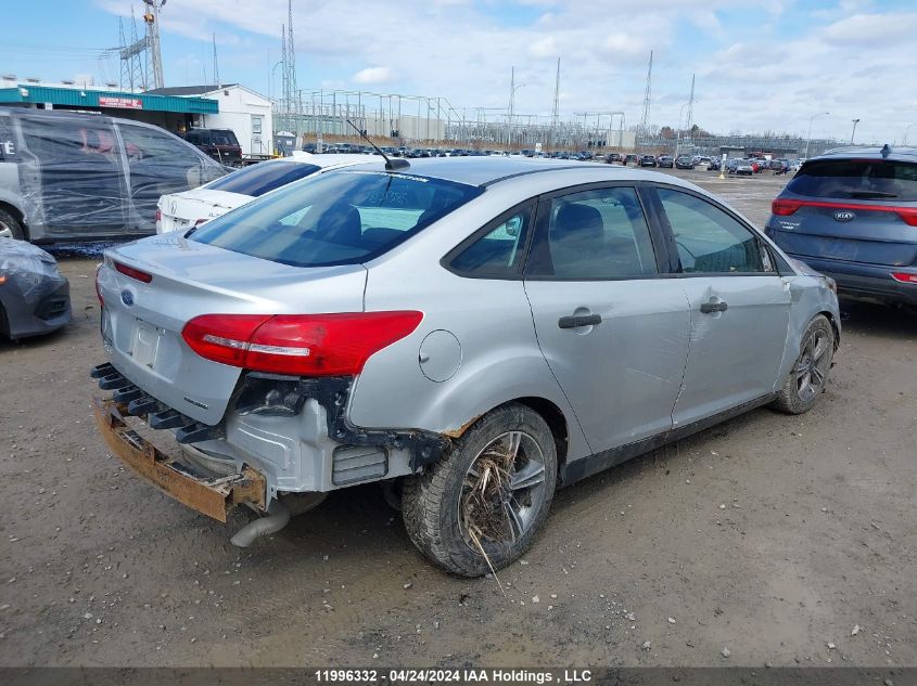 2015 Ford Focus S VIN: 1FADP3E23FL297030 Lot: 11996332