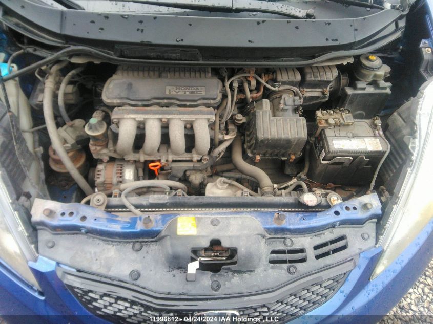 2009 Honda Fit Dx-A VIN: JHMGE87329S808235 Lot: 11996812