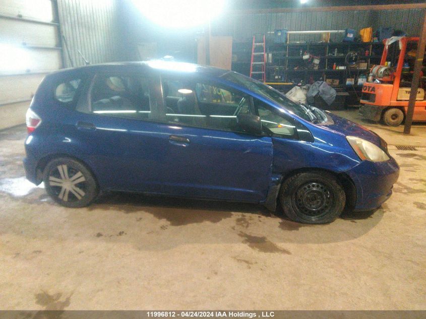 2009 Honda Fit Dx-A VIN: JHMGE87329S808235 Lot: 11996812