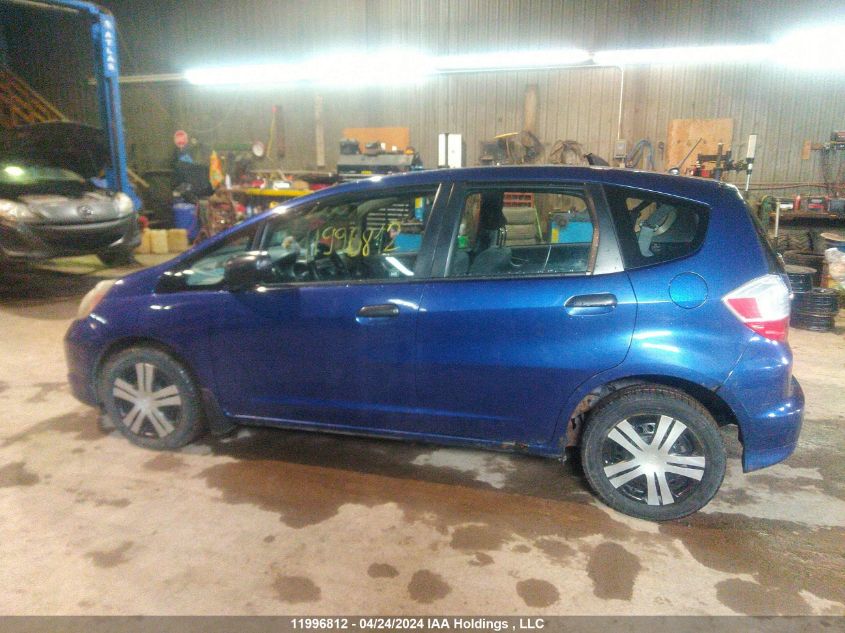 2009 Honda Fit Dx-A VIN: JHMGE87329S808235 Lot: 11996812