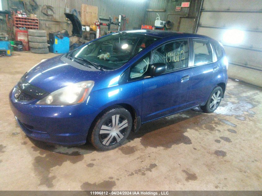 2009 Honda Fit Dx-A VIN: JHMGE87329S808235 Lot: 11996812