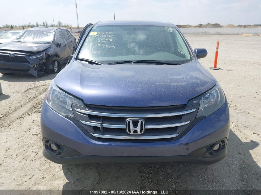 2014 Honda Cr-V VIN: 2HKRM4H76EH104068 Lot: 11997082