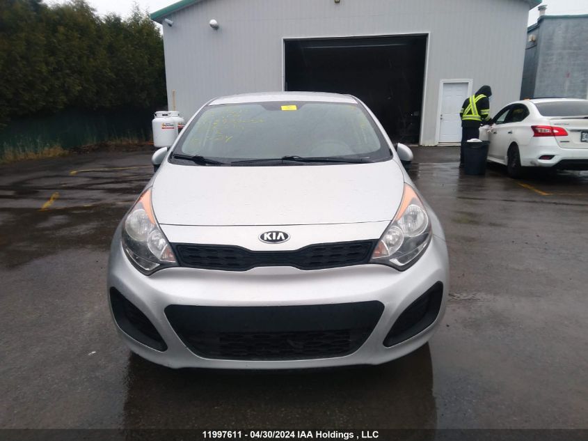 2015 Kia Rio VIN: KNADM5A35F6982056 Lot: 11997611