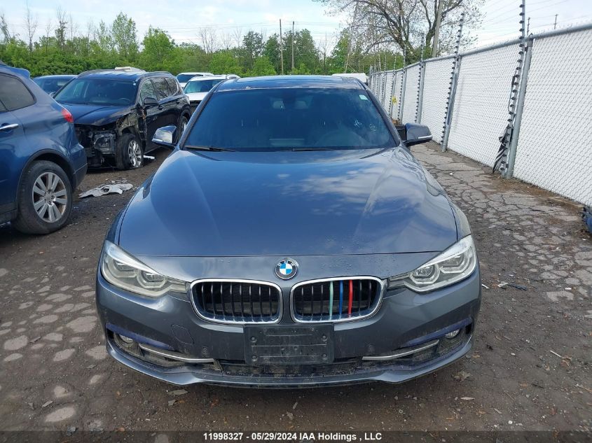 2018 BMW 3 Series VIN: WBA8D9C5XJA614694 Lot: 11998327