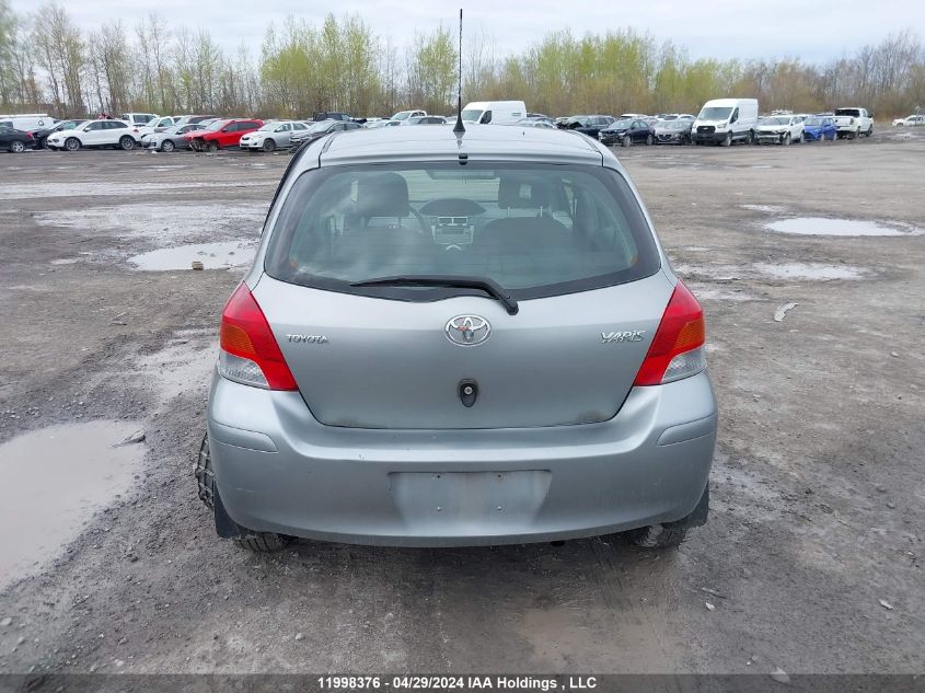 2009 Toyota Yaris VIN: JTDKT923X95266721 Lot: 11998376