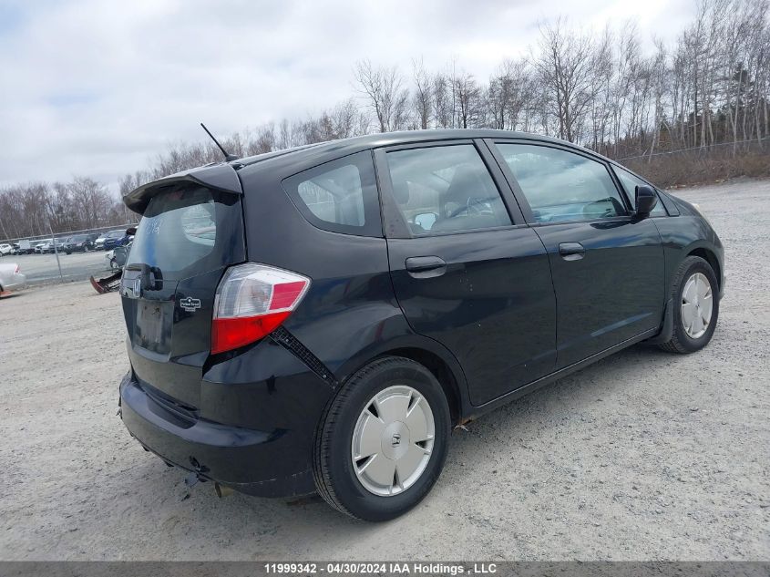 2009 Honda Fit Lx VIN: JHMGE87599S807505 Lot: 11999342