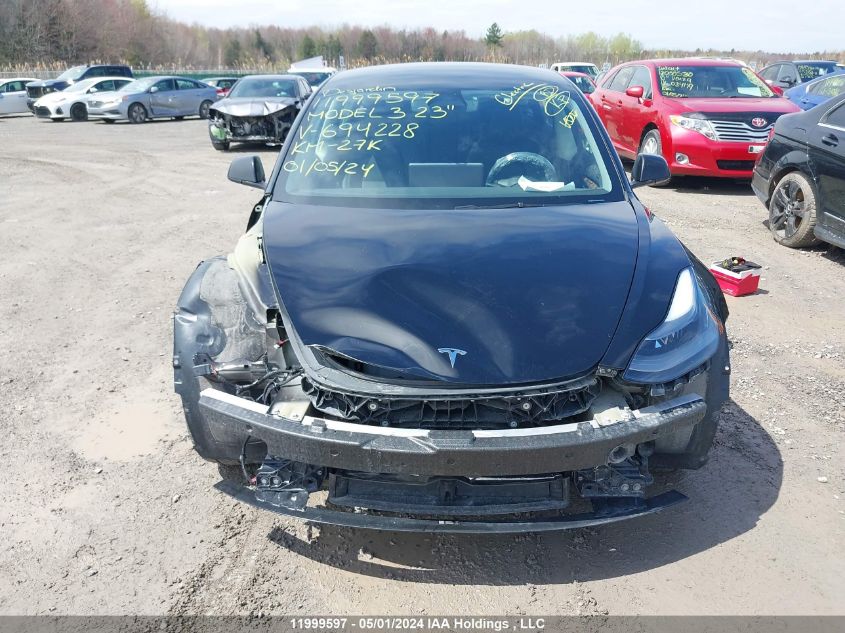 2023 Tesla Model 3 VIN: 5YJ3E1EB9PF694228 Lot: 11999597