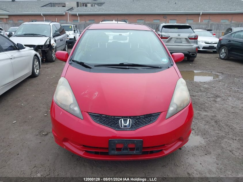 2009 Honda Fit VIN: JHMGE88559S812974 Lot: 12000128