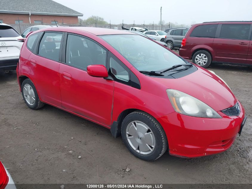 2009 Honda Fit VIN: JHMGE88559S812974 Lot: 12000128