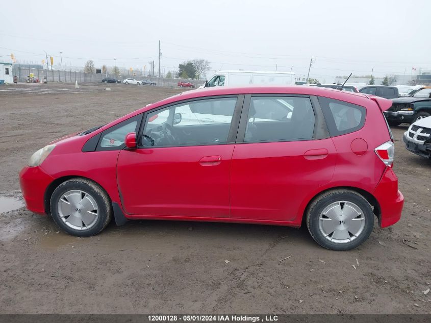 2009 Honda Fit VIN: JHMGE88559S812974 Lot: 12000128