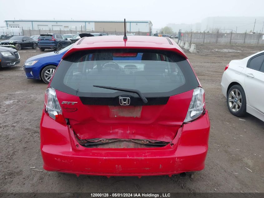 2009 Honda Fit VIN: JHMGE88559S812974 Lot: 12000128