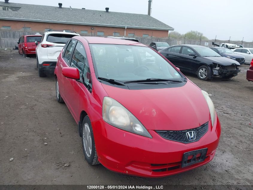 2009 Honda Fit VIN: JHMGE88559S812974 Lot: 12000128