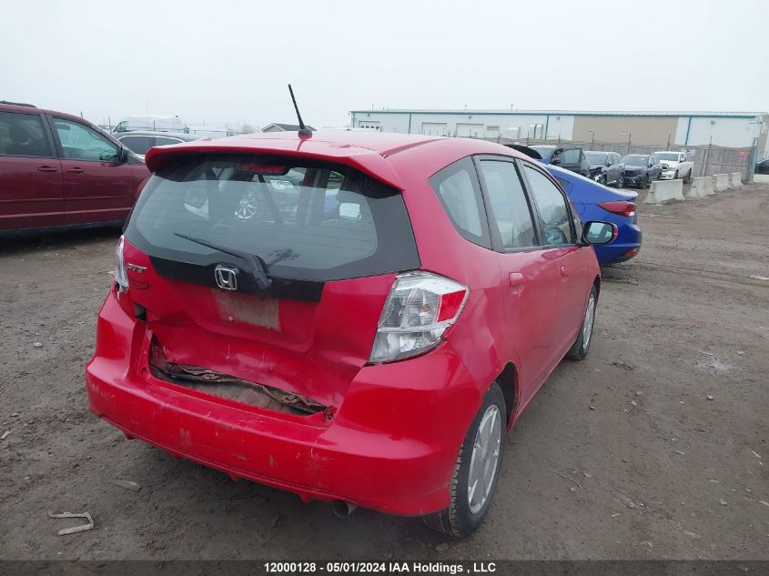 2009 Honda Fit VIN: JHMGE88559S812974 Lot: 12000128