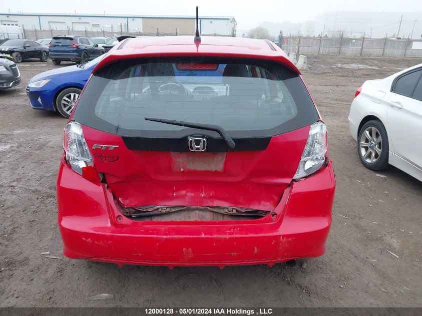 2009 Honda Fit VIN: JHMGE88559S812974 Lot: 12000128