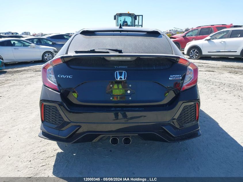 2018 Honda Civic Hatchback VIN: SHHFK7G91JU308975 Lot: 12000345