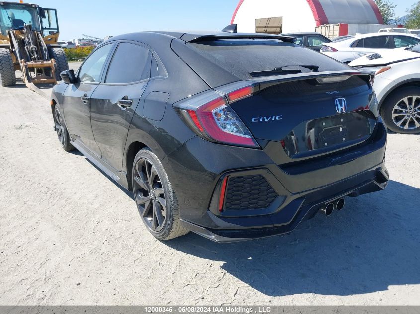 2018 Honda Civic Hatchback VIN: SHHFK7G91JU308975 Lot: 12000345