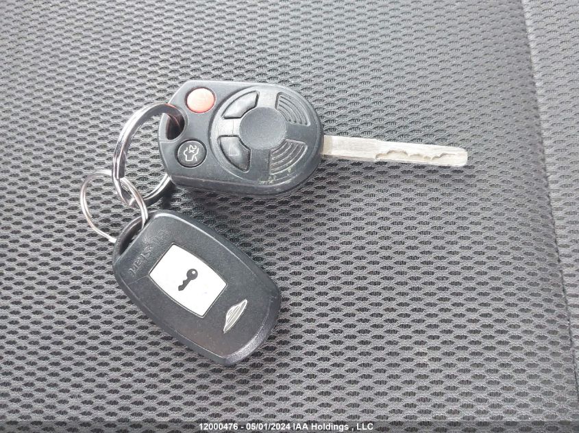 2012 Ford Focus S VIN: 1FAHP3E24CL326211 Lot: 12000476