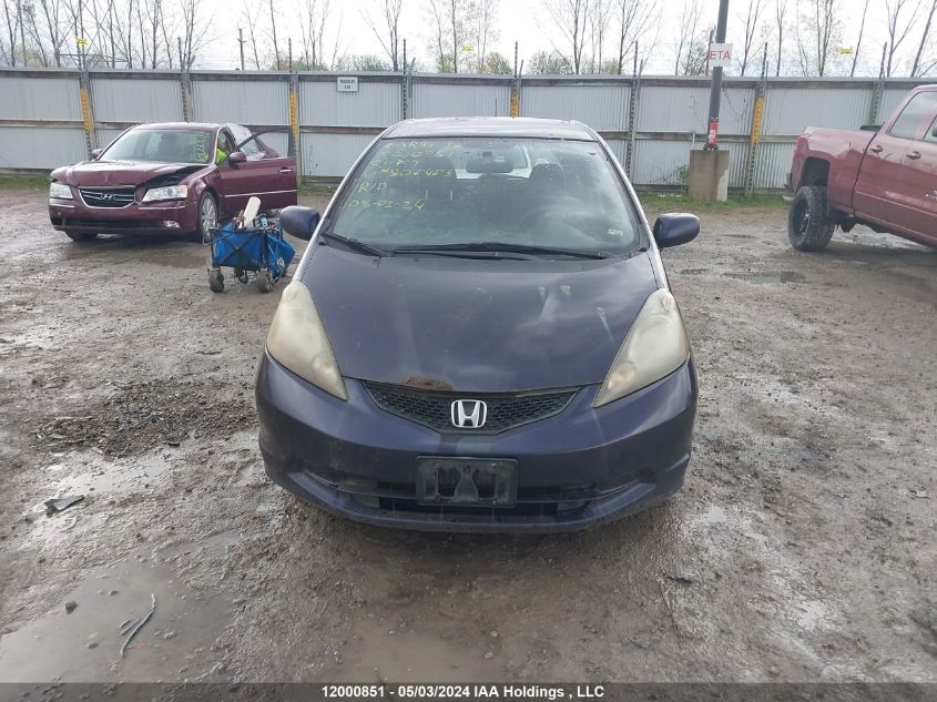 2009 Honda Fit VIN: JHMGE88559S806463 Lot: 12000851