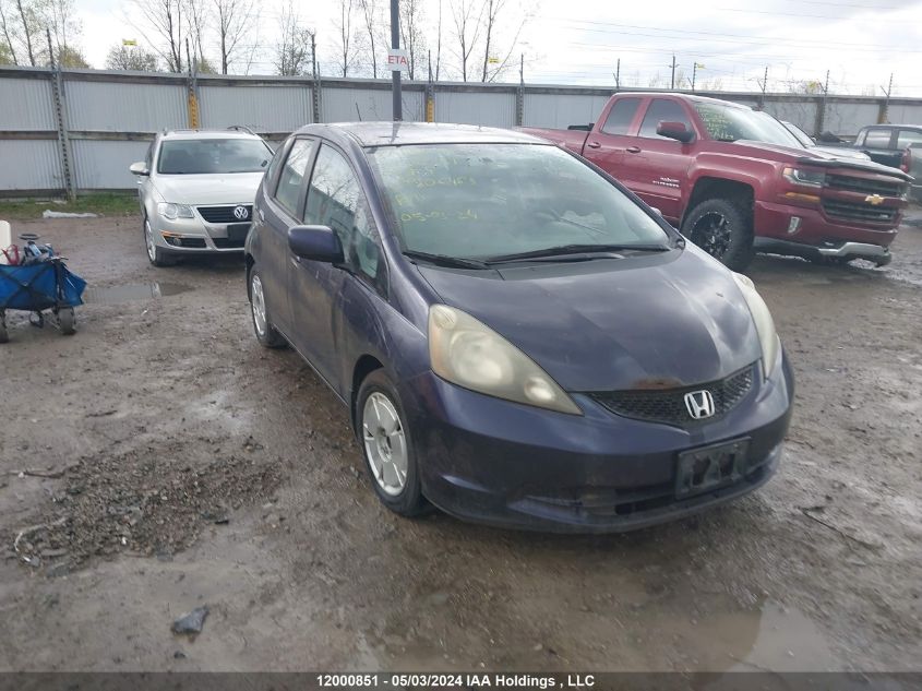 2009 Honda Fit VIN: JHMGE88559S806463 Lot: 12000851