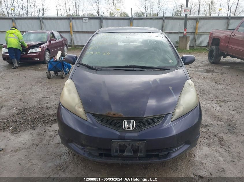 2009 Honda Fit VIN: JHMGE88559S806463 Lot: 12000851