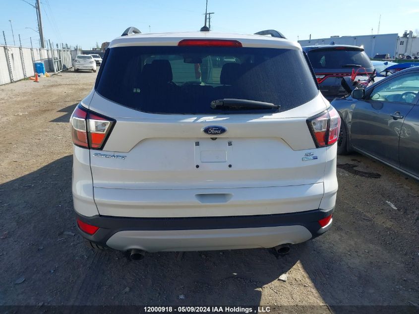 2017 Ford Escape Se VIN: 1FMCU9G9XHUD22011 Lot: 12000918