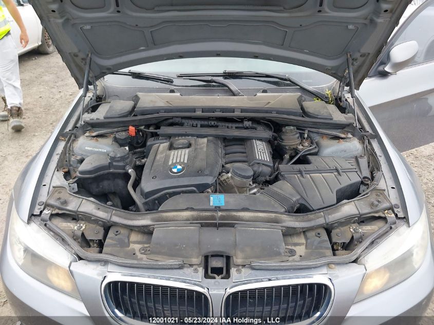 2011 BMW 3 Series VIN: WBAPG7C50BA795166 Lot: 12001021