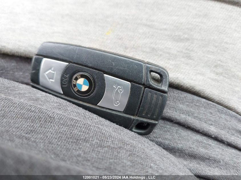 2011 BMW 3 Series VIN: WBAPG7C50BA795166 Lot: 12001021