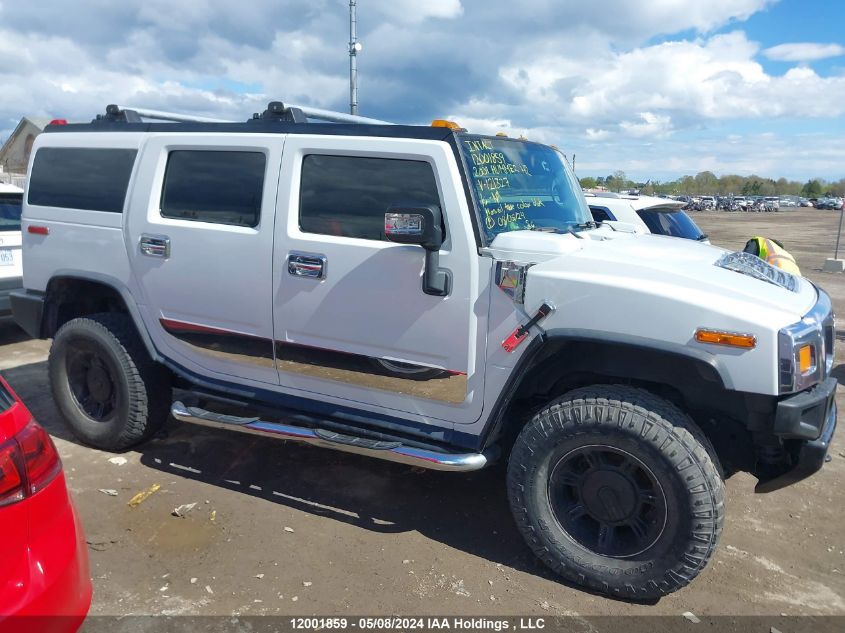 2004 Hummer H2 VIN: 5GRGN23UX4H121327 Lot: 12001859